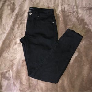 Black mid rise skinny jeans